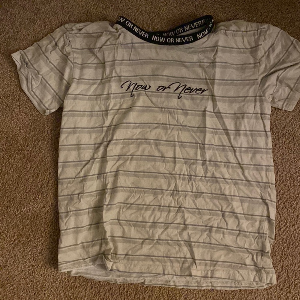 size small packing shirt "now or never" colors tan cream and brown
